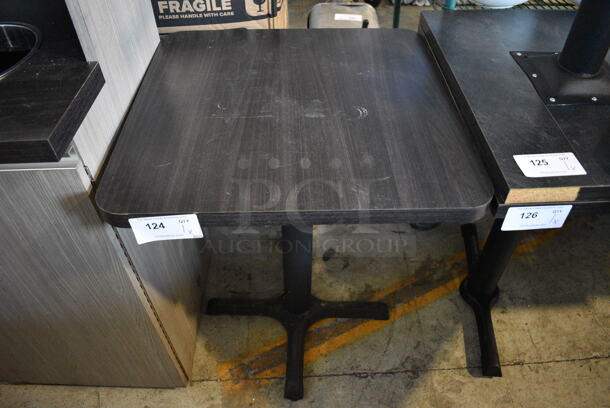 Dark Gray Wood Pattern Dining Table on Black Metal Table Base. Stock Picture - Cosmetic Condition May Vary. 24x24x29.5