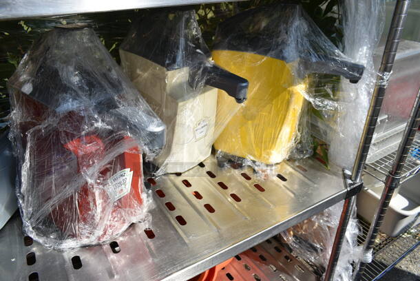 Chrome Finish 4 Tier Shelving Unit w/ Contents Including Fire Extinguisher, Wet Floor Caution Sign, Salad Spinner. BUYER MUST DISMANTLE. PCI CANNOT DISMANTLE FOR SHIPPING. PLEASE CONSIDER FREIGHT CHARGES. We Will Not Ship The Fire Extinguisher.  - Image 11 of 12
