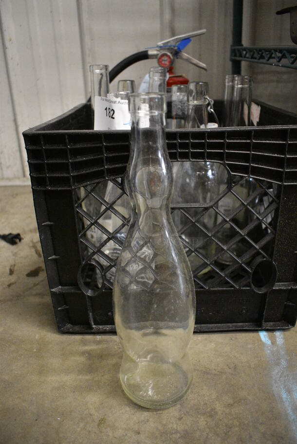 9 Various Glass Bottles. Includes 4x4x11.5. 9 Times Your Bid!