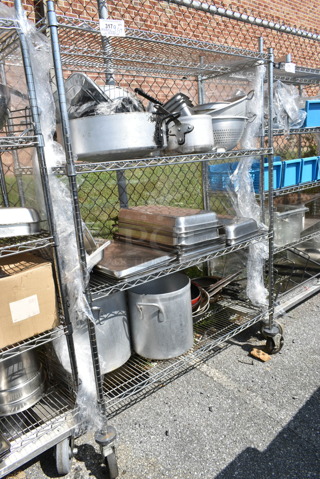 Chrome Finish 4 Tier Shelving Unit w/ Contents Including Stainless Steel Drop In Bins, Colander, Stock Pots. BUYER MUST DISMANTLE. PCI CANNOT DISMANTLE FOR SHIPPING. PLEASE CONSIDER FREIGHT CHARGES. 