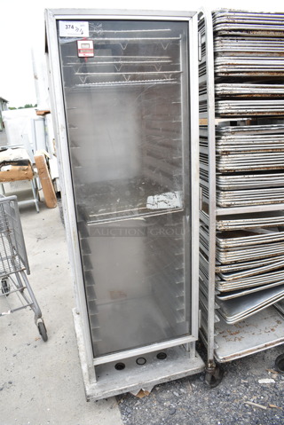 Wilder Metal Commercial Enclosed Pan Transport Rack on Commercial Casters.