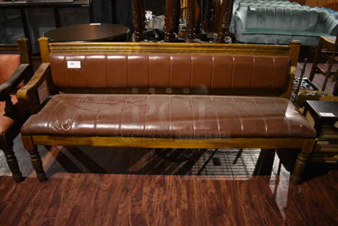 Wooden Bench w/ Brown Cushion. 77x22x37. (lounge)