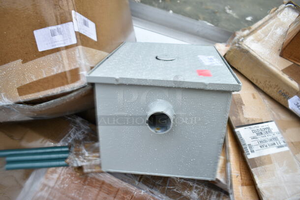 BRAND NEW SCRATCH AND DENT! Zurn GT2700-10-2NH 20 lb. 10 GPM Grease Trap with 2" No-Hub Connections - Image 2 of 4
