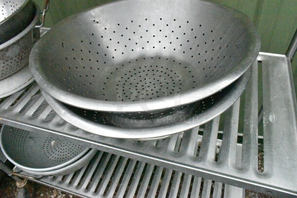 Metal 4 Tier Shelving Unit w/ Contents Including Colanders. BUYER MUST DISMANTLE. PCI CANNOT DISMANTLE FOR SHIPPING. PLEASE CONSIDER FREIGHT CHARGES.
 - Image 4 of 9