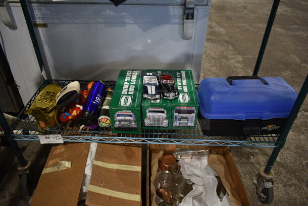 ALL ONE MONEY! Tier Lot of Various Items Including Hess Trucks, Nike Sandal and Water Bottle. - Image 1 of 5