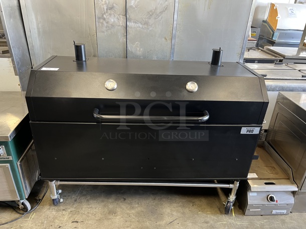 BRAND NEW SCRATCH AND DENT! Backyard Pro 554SMOKR60KD Metal Commercial Wood / Charcoal Smoker Grill on Commercial Casters. 70x30x44 - Image 3 of 7