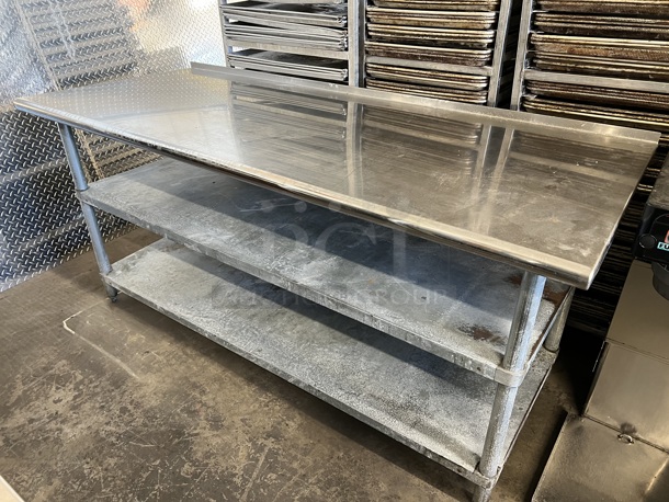 Stainless Steel Commercial Table w/ 2 Metal Under Shelves. 72x30x34