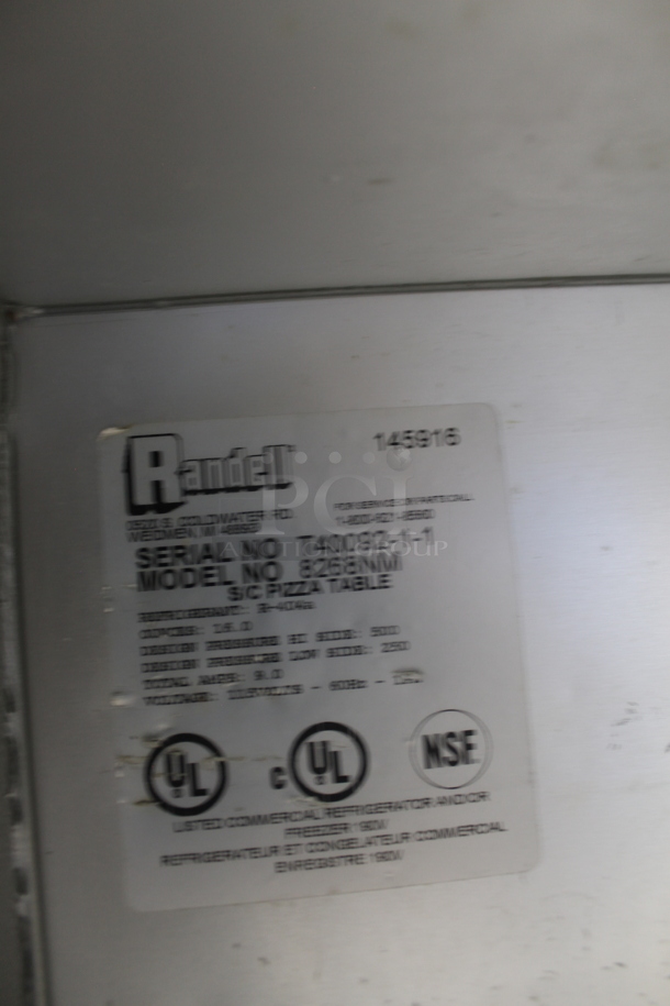 Randell Pizza Prep Table 8264NM w/ Poly Coated Racks on Commercial Casters. 115 Volt, 1 Phase. Tested and Powers On But Does Not Get Cold
 - Image 8 of 8