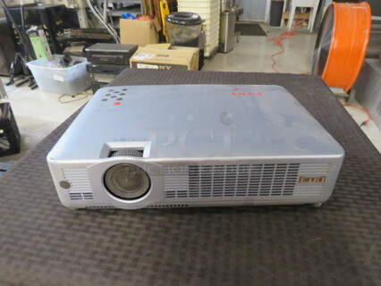 One EIKI Brilliant Projector. #LC-XB33.