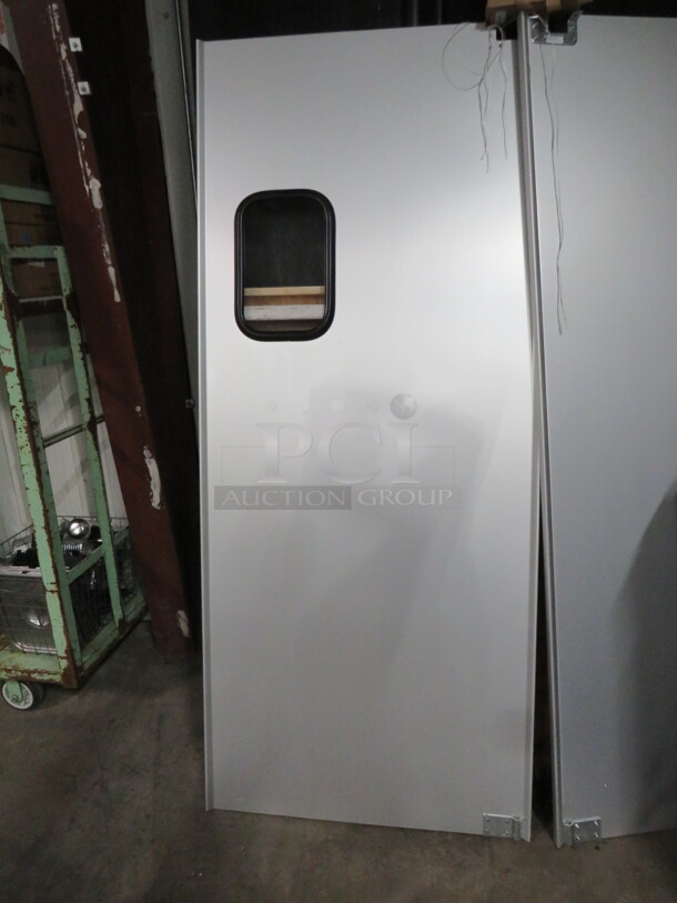 One NEW Stainless Steel Kitchen Traffic Door With Hardware. 35X82.5 - Image 1 of 1