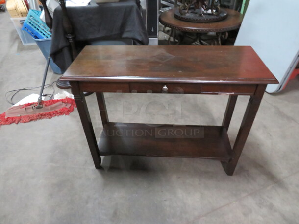 One Wooden  Table With 1 Drawer And Under Shelf. 40X16X29.5