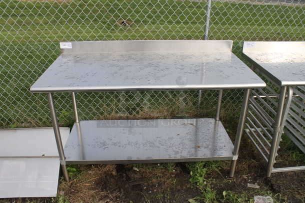 Stainless Steel Commercial Table w/ Back Splash and Under Shelf. - Image 1 of 3