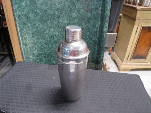 One Stainless Steel Mixing Glass With Shaker Lid.