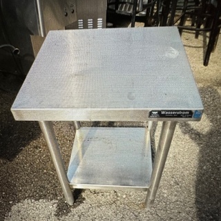One Wasserstrom Stainless Steel Table With Stainless Steel Under Shelf. 20X21X27