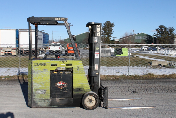 Clark ESX25 Metal Industrial 5,000 Pound Capacity Electric Powered Rider Forklift w/ EnerSys EF3-18-1050 Battery Charger. 8,523 Hours. Forklift is Tested and Working!