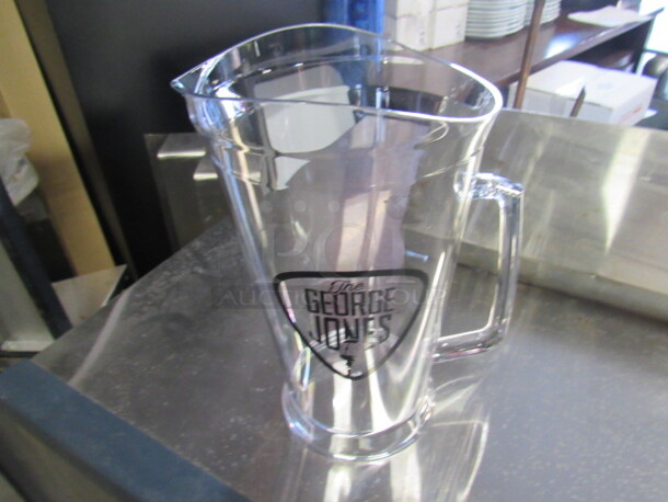 One NEW Poly Beverage Pitcher With The George Jones Logo.