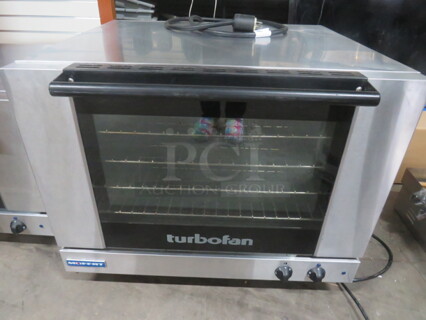 One Moffat Turbo Fan Full Size Convection Oven, With 4 Racks. Model# E26M4. 208 Volt. 1 Phase.  32X31X26