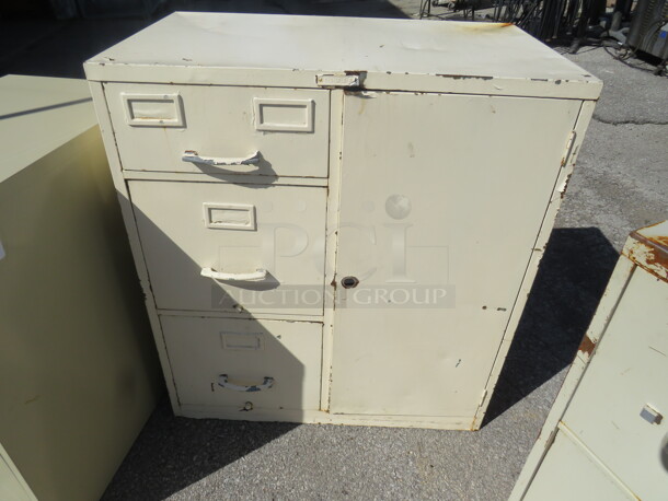 One Tower 3 Drawer, 1 Door  Metal File Cabinet On Casters. 29.5X18X33. - Image 1 of 1