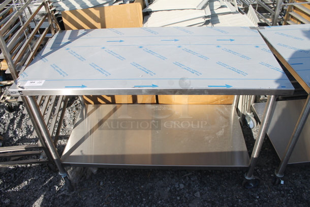 BRAND NEW! Stainless Steel Commercial Table w/ Under Shelf on Commercial Casters.
