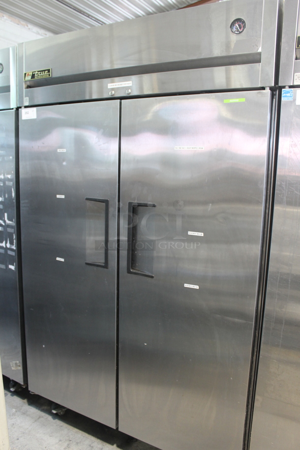 2015 True TG2R-2S ENERGY STAR Stainless Steel Commercial Two Door Reach In Cooler w/ Poly Coated Racks on Commercial Casters. 115 Volts, 1 Phase. Tested and Working! - Image 1 of 9