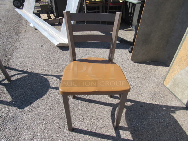 Brown Metal Chair With A Brown Poly Seat. 3XBID