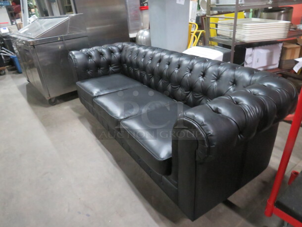 One Black Pleather Couch. 88X35X30 - Image 2 of 2