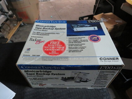 One Mini Cartridge Tape Backup System.
