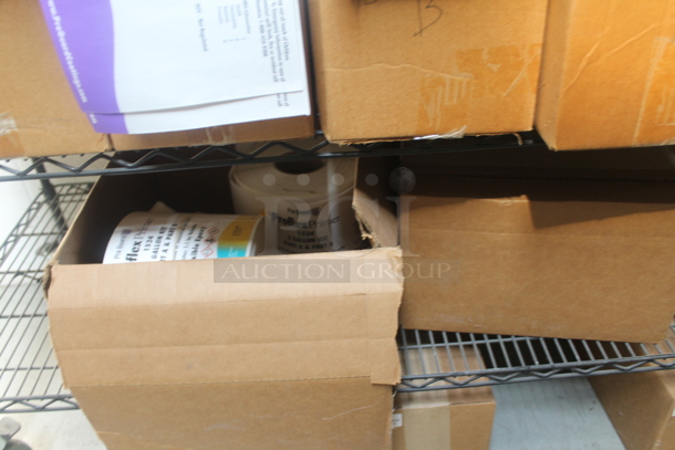 Black 4 Tier Wire Shelving Unit w/ Contents Including Labels on Commercial Casters. BUYER MUST REMOVE. - Image 6 of 7