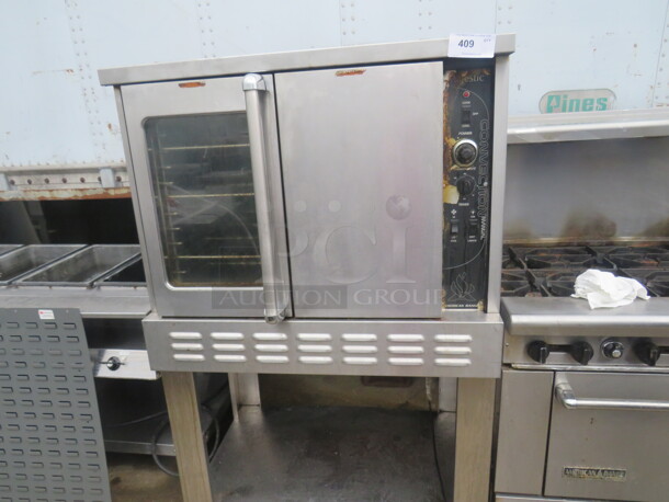 One Majestic American Range Natural Gas Manual Convection Oven With 5 Racks On Stand With Under Storage. 40X28X64