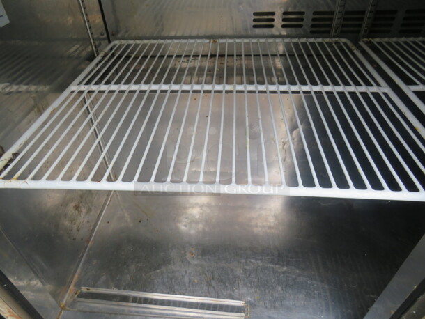 One Blue Air 3 Door Refrigerated Prep Table With 2 SS Over SHelves, 48 Inch Ticket Rail, 10 Inch Wire Basket, And 3 Racks, On Casters. Model# BAPT72. 115 Volt. 72X30X68 - Image 4 of 5