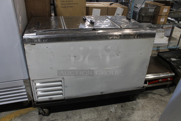 Metal Commercial Chest Freezer w/ 2 Center Hinge Lids on Commercial Casters. 110-120 Volts, 1 Phase. Tested and Working!