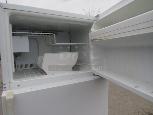 One GE Refrigerator/Freezer. 110 Volt. Model# GTH18HCTRRWW. 28X30X66.5 - Image 3 of 3