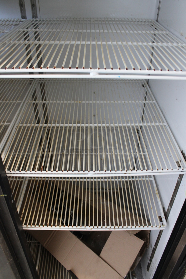 2013 True TG2R-2S ENERGY STAR Stainless Steel Commercial 2 Door Reach In Cooler w/ Poly Coated Racks and Commercial Casters. 115 Volts, 1 Phase. Tested and Working! - Image 6 of 7