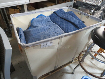 One Linen Cart Full Of Assorted Moving Blankets.