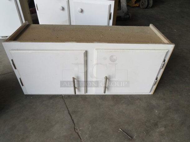 One 2 Door Cabinet. 34X13X18 - Image 1 of 1