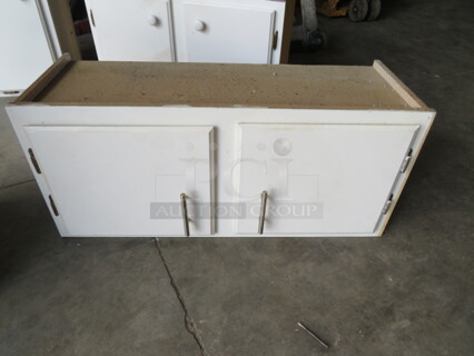 One 2 Door Cabinet. 34X13X18
