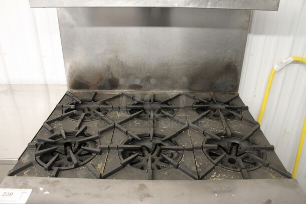 Garland H286 Stainless Steel Commercial Natural Gas Powered 6 Burner Range w/ Oven, Over Shelf and Back Splash.  - Image 2 of 8
