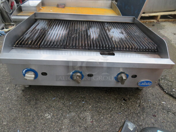 One Globe Natural Gas Charbroiler.  36X26.5X15