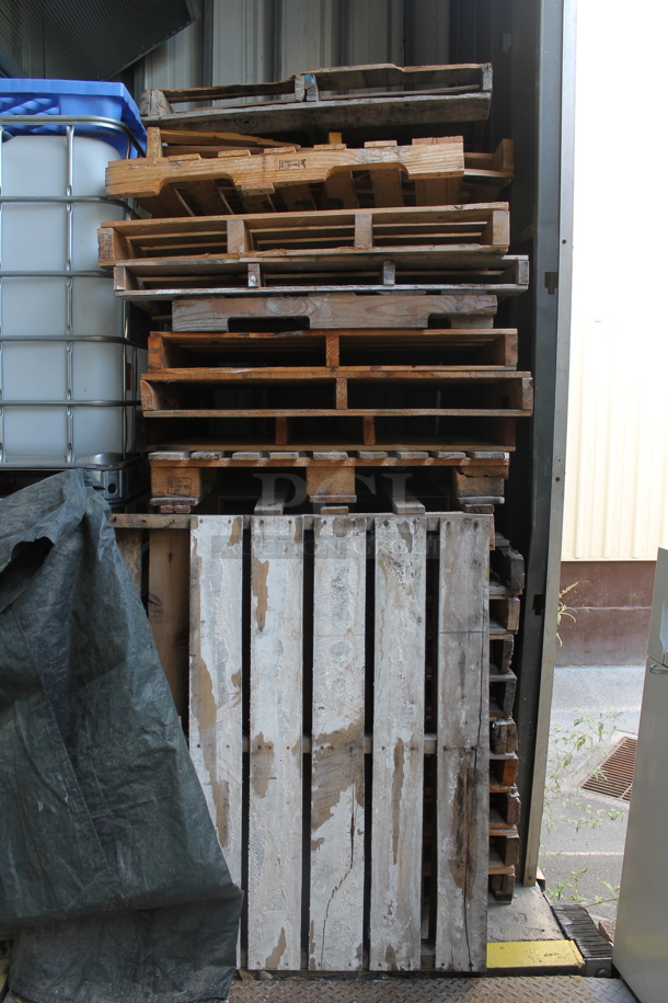 ALL ONE MONEY! Lot of 22 Wooden Pallets. BUYER MUST REMOVE.  - Image 1 of 3