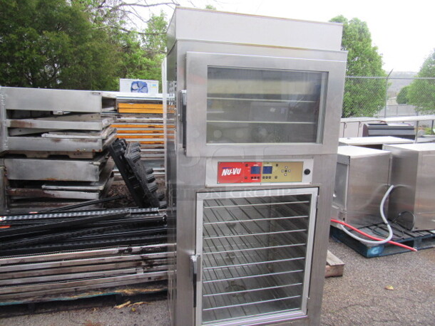 One NUVU Oven/Proofer With 11 Racks On Casters. Model# SUB-123P. 208 Volt. 3 Phase. 36X29X77.5