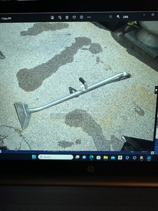 One Stainless Steel Carpet Extractor Handle.