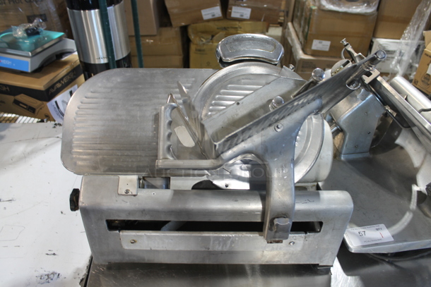 Globe 612A Stainless Steel Commercial Countertop Meat Slicer w/ Blade Sharpener. 115 Volts, 1 Phase. Tested and Working!