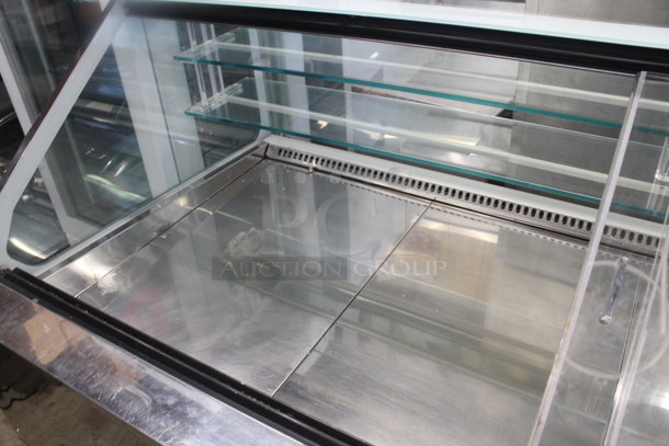 2019 IFI SAM80-PVAD-2125-AB Stainless Steel Commercial Floor Style Freezer Display Case Merchandiser. Picture of Unit Before Removal Is Used As Gallery Picture; See Subsequent Pictures For The Portion of the Display Case That This Lot Is. 208-220 Volts, 1 Phase. - Image 3 of 8