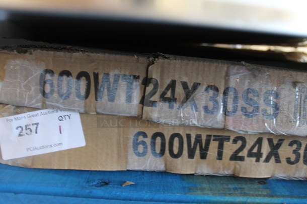 BRAND NEW SCRATCH AND DENT! Regency 600WT24X30SS 24" x 30" 16-Gauge 304 Stainless Steel Commercial Open Base Work Table - Image 2 of 3