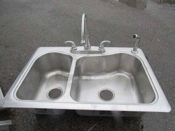 One KOHLER Stainless Steel 2 Well Drop In Sink With Faucet And Hose Sprayer. 33X22X8.5