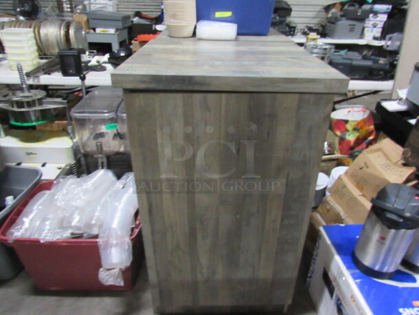 One Wood Look 1 Door Trash Receptacle. 26X26X43