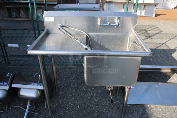 Stainless Steel Commercial Single Bay Sink w/ Left Side Drainboard, Handles, Faucet and Spray Nozzle Attachment. 42x26x44.5. Bays 20x20x14. Drainboards 18x21x1