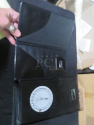 One Lot Of 5 Check Holders.
