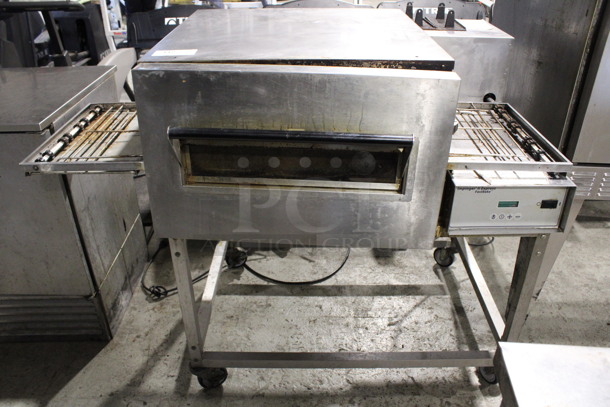 Lincoln Impinger Model 1116-000 Stainless Steel Commercial Natural Gas Powered Single Deck Conveyor Pizza Oven on Commercial Casters. 56x39x45