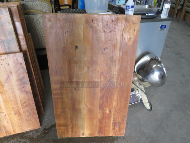 One 1.5 Inch Thick Solid Wood Table Top. 25X42